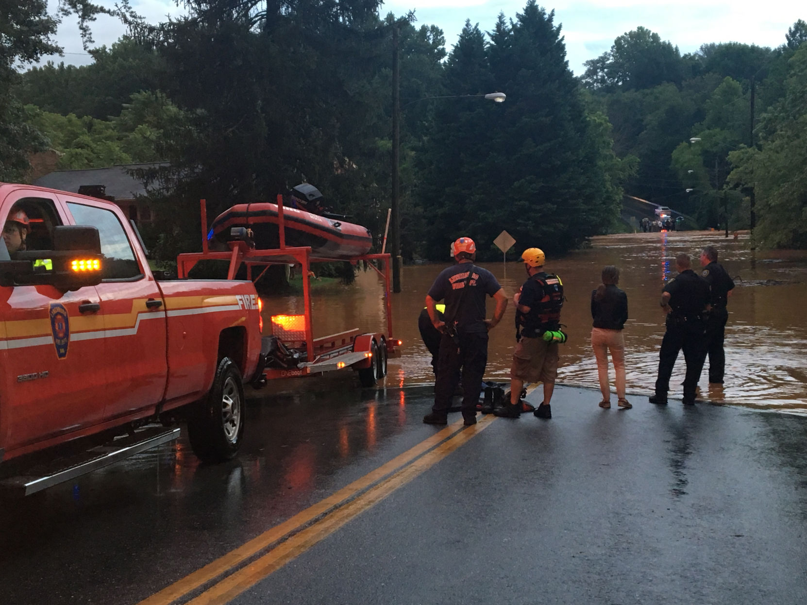Rescue boats are called to assist residents on Greenwood Drive.